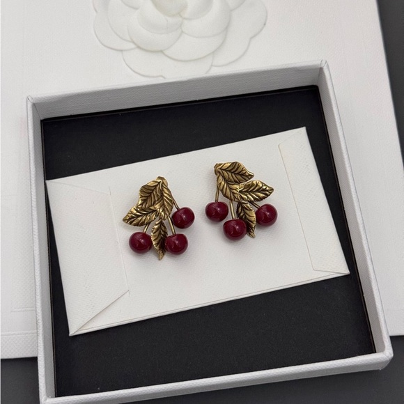 Yves Saint Laurent Gold Leaf Cherry Drop Earrings with Deep Red Beads